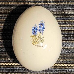 This is a Texas Bluebonnet ceramic egg collectible.